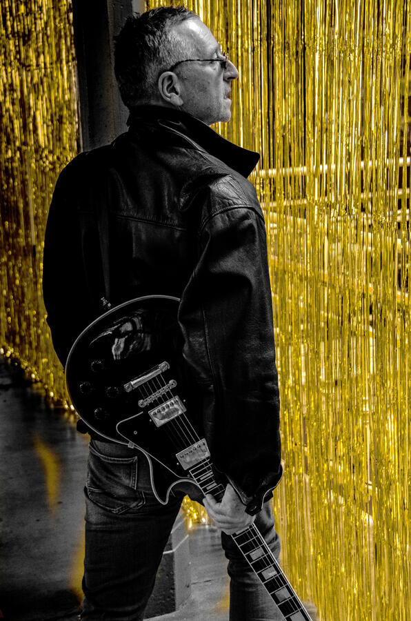 Rock artist portrait in leather jacket, black-and-white. Rock artist portrait in leather jacket, black-and-white.